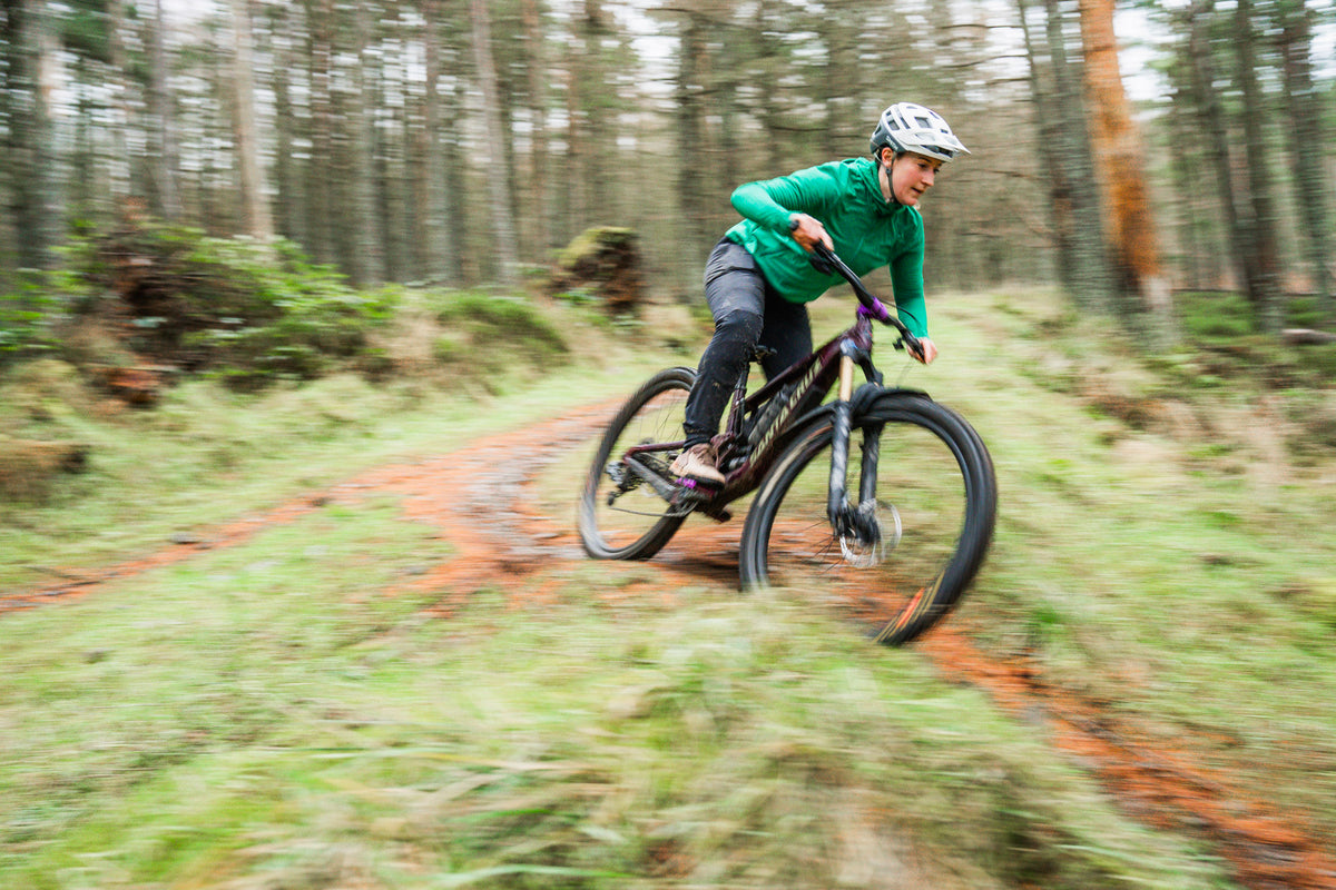 Dirt School Coach, Fi, riding Green Wing wearing her Chilco Anorak